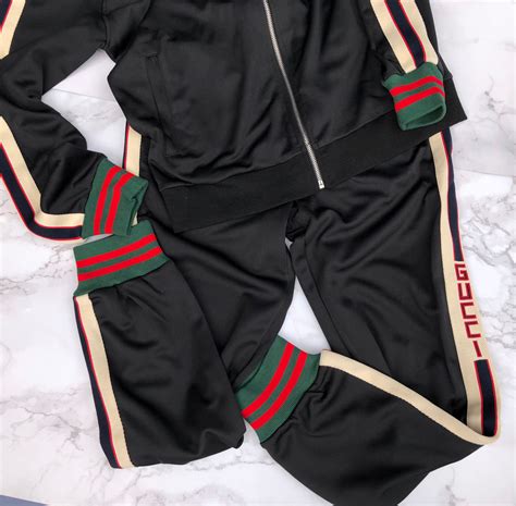 retro black gucci silk track suit